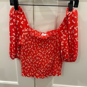 Lush coral flower printed smocked top